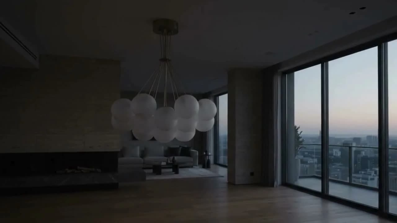 Warm architectural living room illuminated by designer lighting